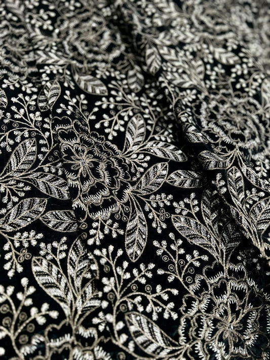 Premium black velvet fabric with intricate gold embroidery and detailed floral vine pattern.
