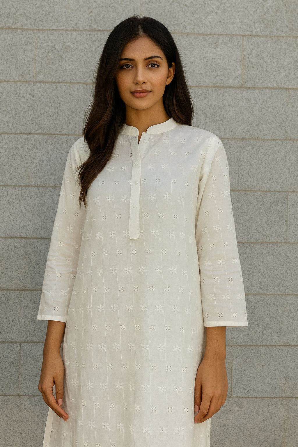 Close-up of soft, breathable White Hakoba Schiffli Cotton Fabric with a 44-inch width and elegant cutwork, perfect for ethnic wear and Indo-Western dresses.
