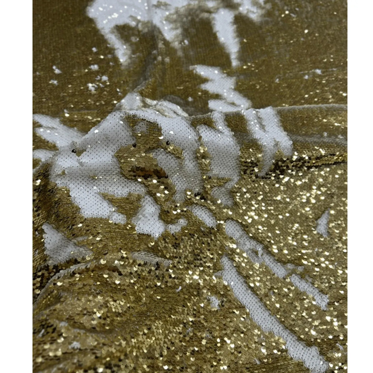 Luxury Gold White Reversible Sequin Net Fabric featuring dual-tone gold and white flip sequins with heavy glitter work in a close-up drape. Perfect for bridal wear, party wear gowns, lehengas, sarees, cocktail dresses and couture fashion.