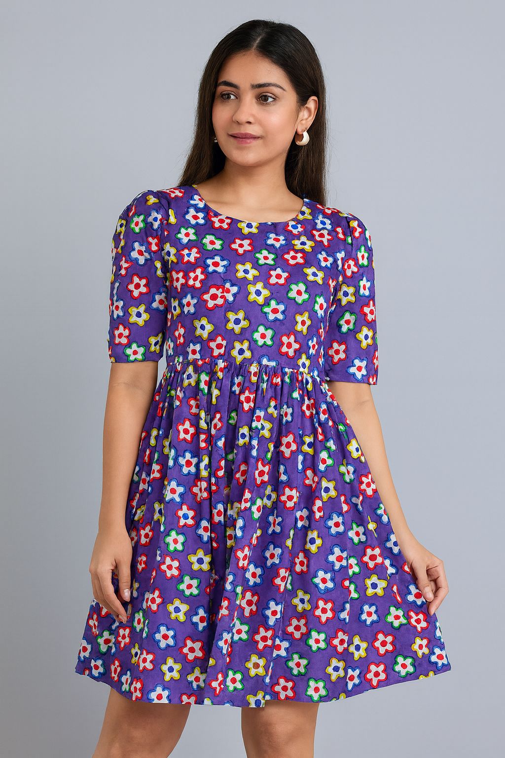 Vibrant deep purple pure cotton Hakoba fabric with multicolor floral print and delicate cutwork embroidery, perfect for stylish festive wear and dresses.