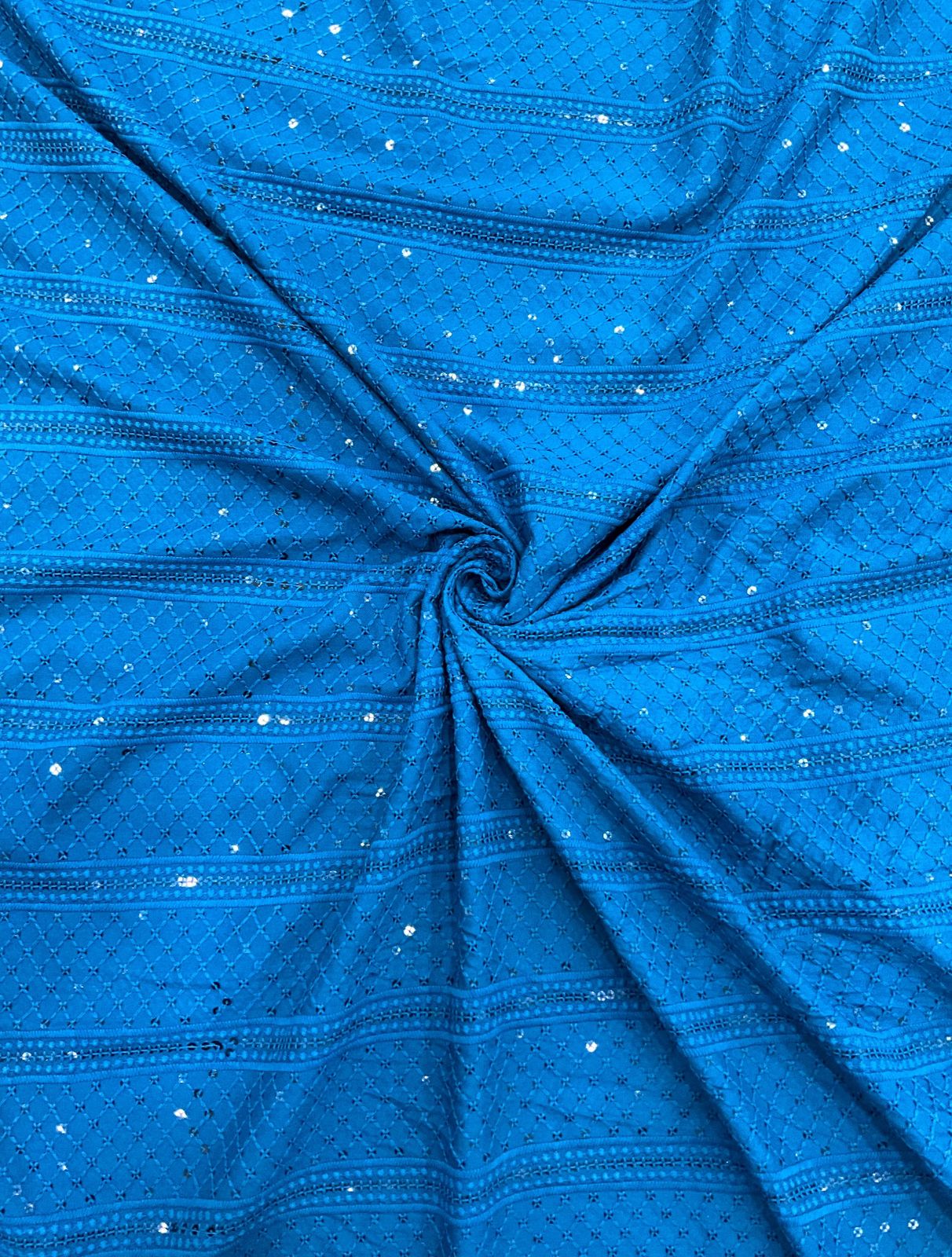 "Designer blue mirror-work fabric shown with child model wearing matching kurta — traditional boys outfit for festivals, parties, and special occasions."