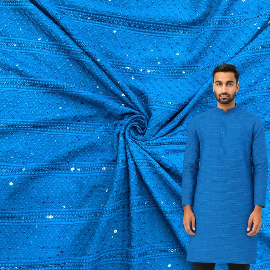Men’s kurta fabric in rich blue color featuring detailed embroidery and sequence work for festive and wedding wear