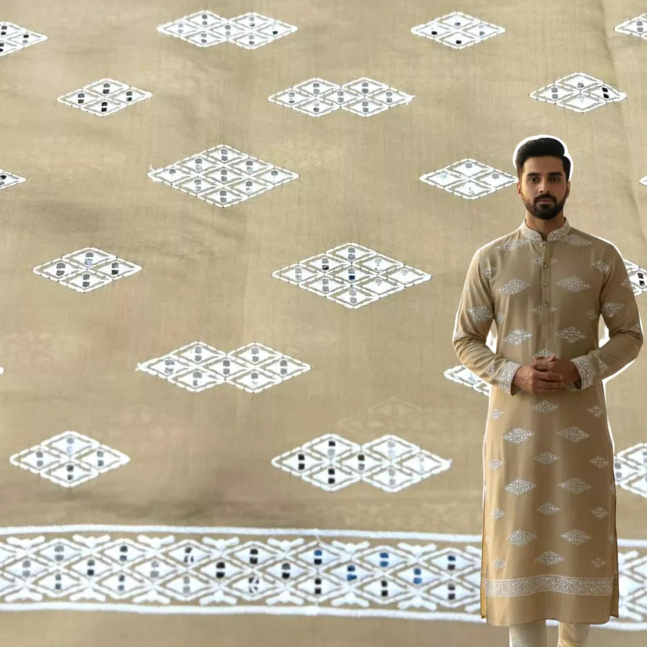 Men’s beige Roman silk kurta fabric with white mirror work and embroidery — premium festive material.