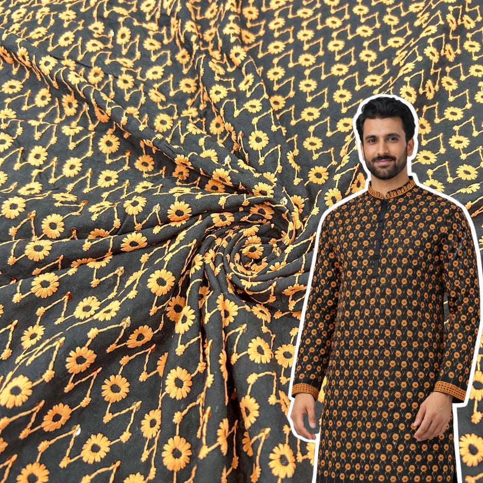 Black contrast floral embroidered fabric with yellow thread and sequin work for festive wear.