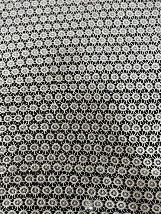 Premium white circular cutwork lace fabric with dense embroidered net design — ideal for kurtis, tops and designer dresses.