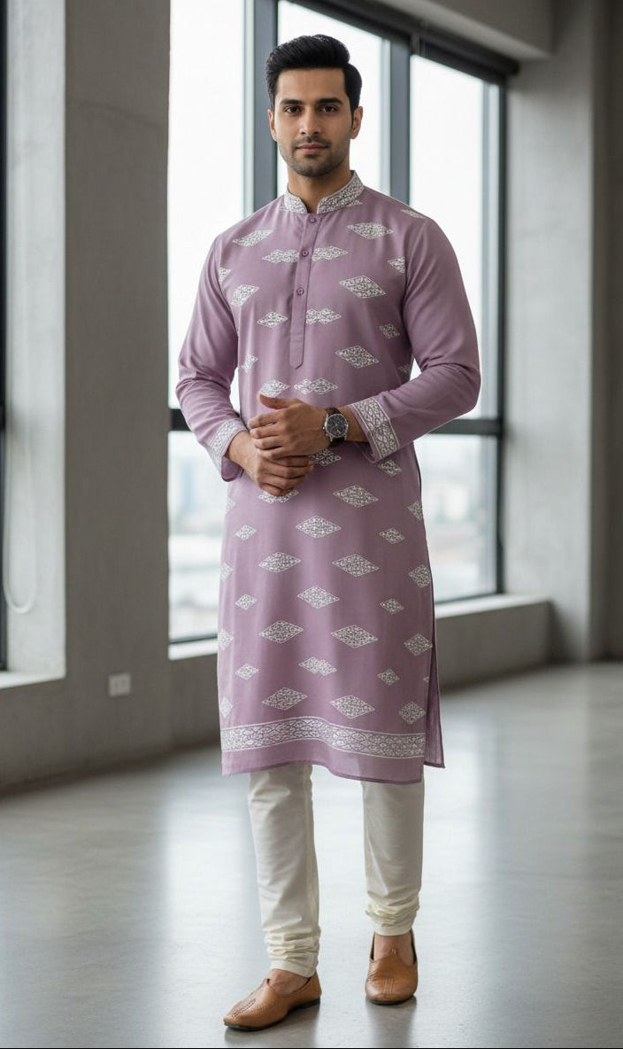 Men’s ethnic onion pink Roman silk fabric featuring contrast white mirror work embroidery for festive and party wear kurta.