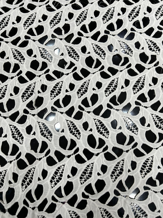 Premium white lace jacquard net fabric with leaf-pattern cutwork — ideal for tops, kurtis, overlays and designer garments.