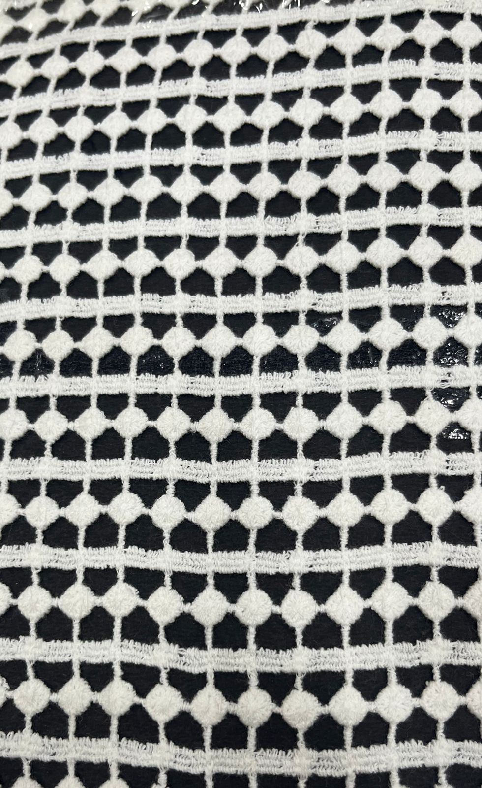 White/Cream Chemical Lace Fabric by the yard, showcasing a continuous repeating pattern of a scalloped edge and textured Venice lace bobbles.
