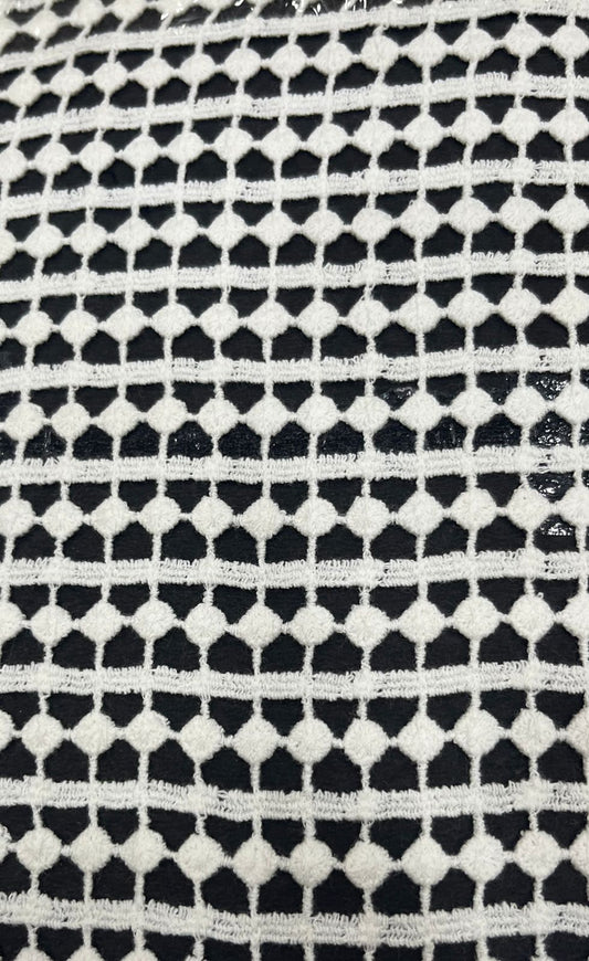 White/Cream Chemical Lace Fabric by the yard, showcasing a continuous repeating pattern of a scalloped edge and textured Venice lace bobbles.