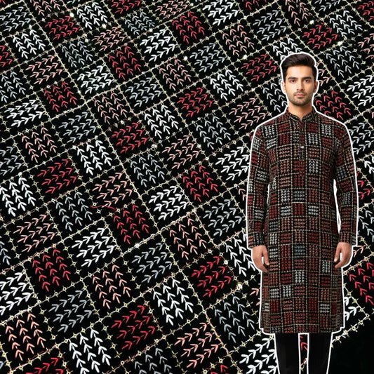 Premium black velvet fabric featuring multicolor geometric arrow embroidery in red, white and peach, ideal for wedding lehengas, Indo-western jackets and luxury winter wear.