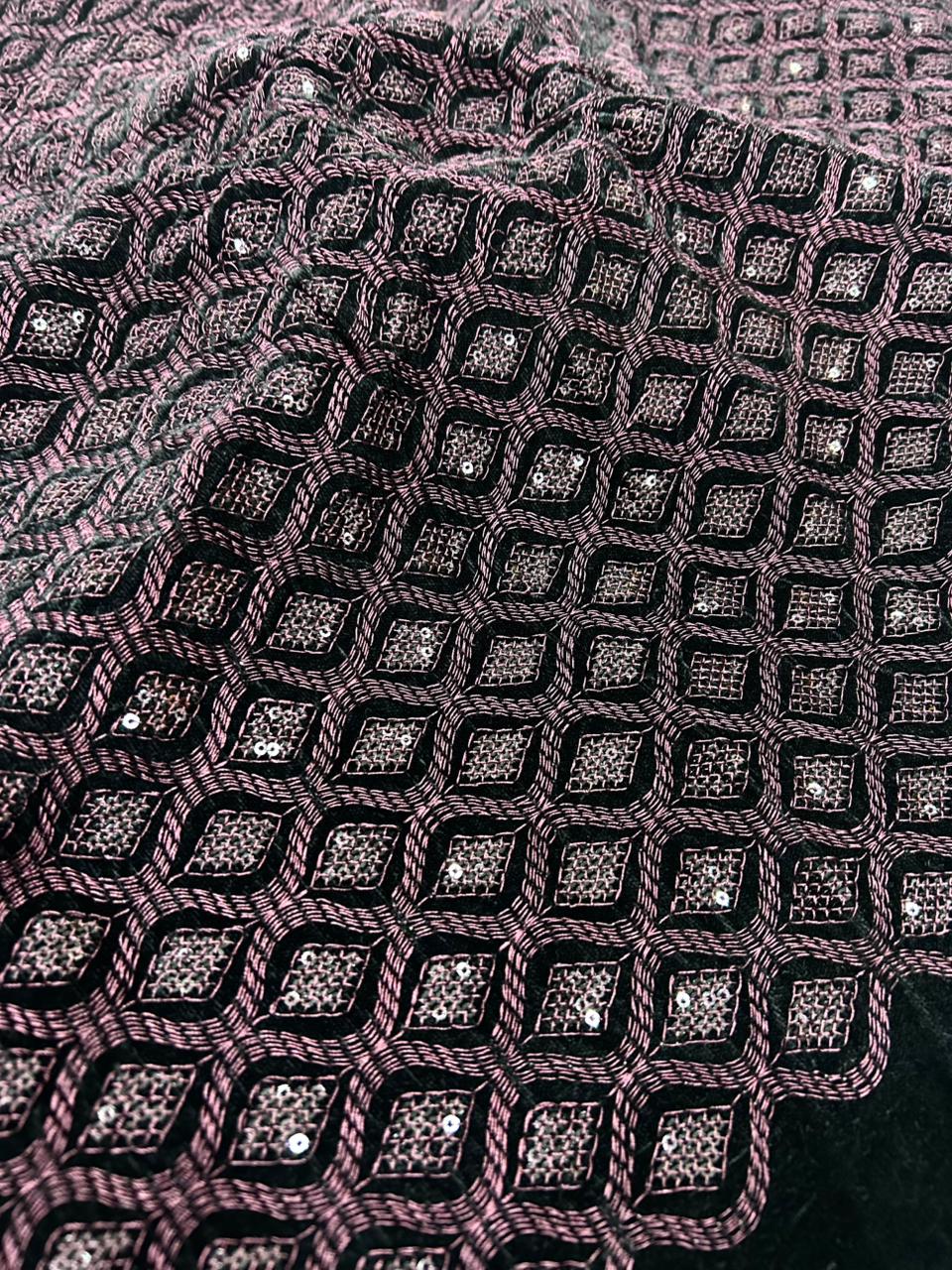 Premium black velvet fabric featuring rich wine color metallic embroidery and sequins, ideal for bridal sherwani, waistcoat, gowns and luxury winter wear.