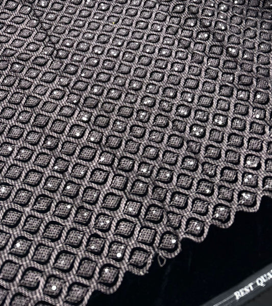 Lavender velvet fabric with dense geometric embroidery and scattered sequin highlights, showcasing a luxury textured pattern suitable for sherwani, koti, kurti and Indo-western outfits.