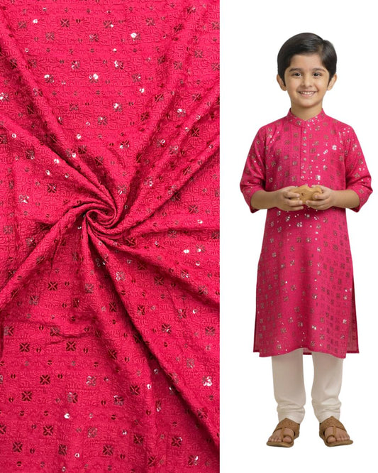 "Bright pink embroidered fabric swatch with mirror work next to a young boy wearing a matching pink kurta set."