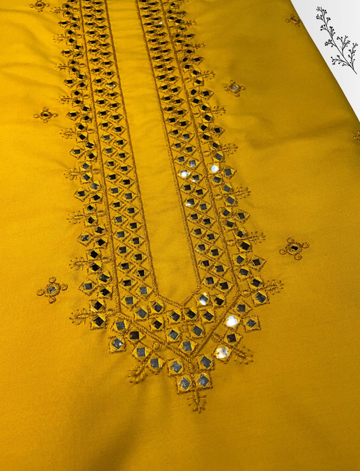 Close-up of shisha embroidered kurta material, showing the texture and design. A versatile fabric, perfect for Haldi Special or Daily Wear.