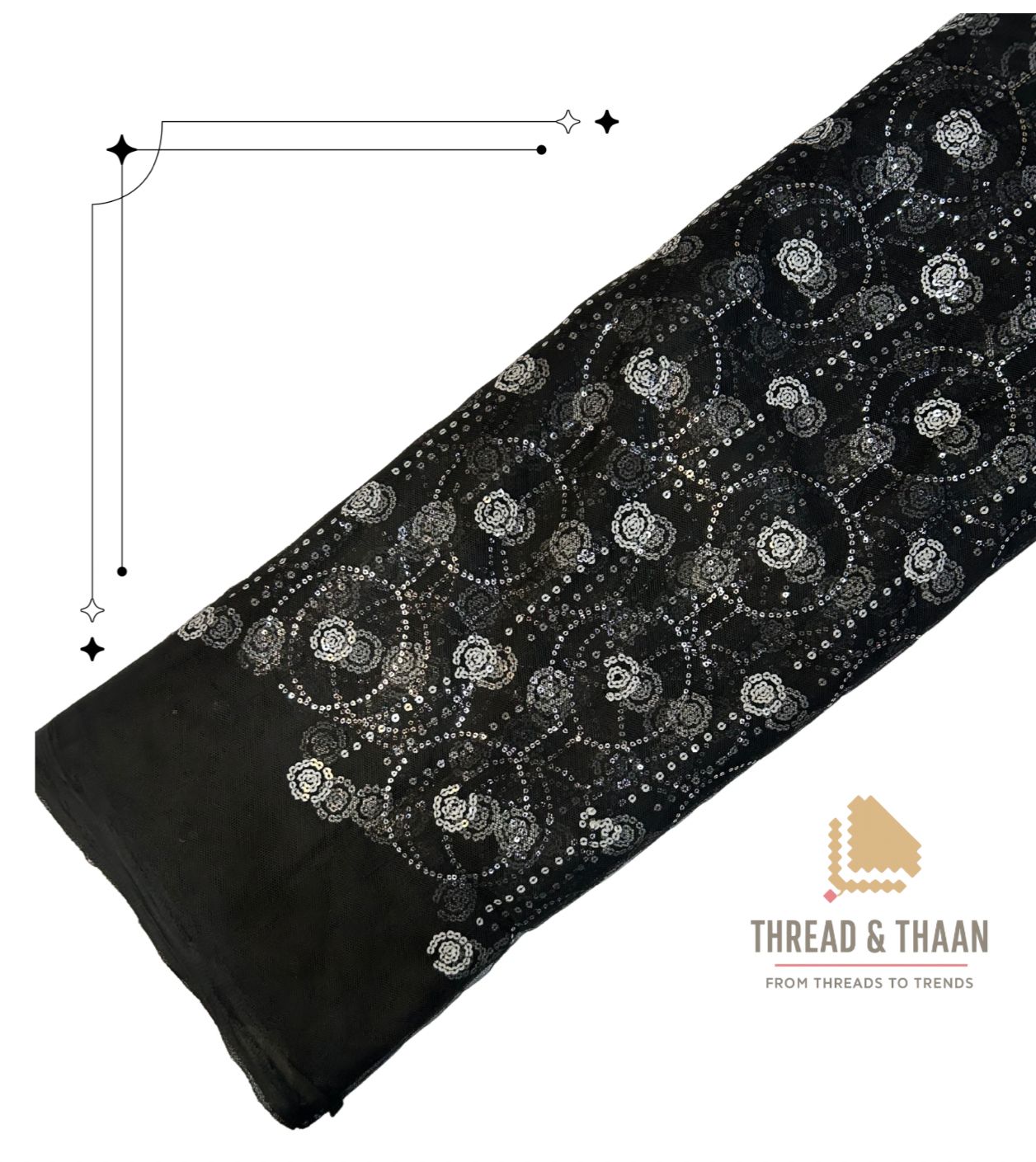 Premium black net fabric with dense white sequin embroidery in an intricate paisley or circular pattern, perfect for designer lehengas and gowns.