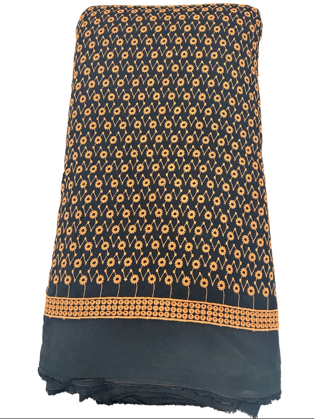 "Designer floral pattern fabric shown with child wearing matching kurta — perfect for boys festive fashion, party wear, and cultural events."