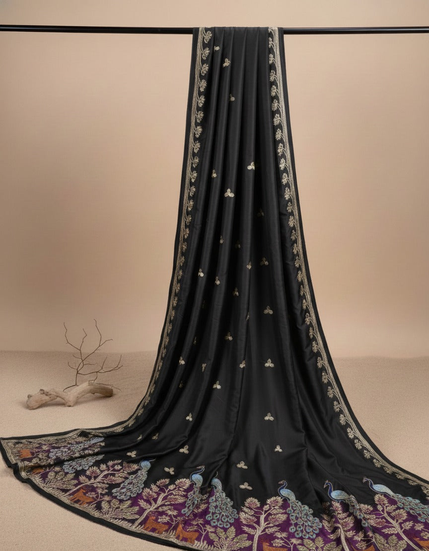 Designer black malai satin kurta fabric with colorful peacock motif and floral daman embroidery, premium fabric for wedding and festive wear.
