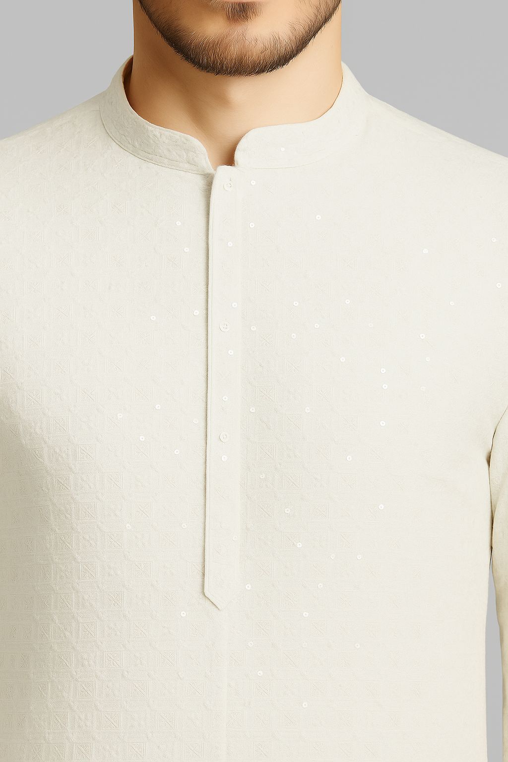 Premium white rayon viscose sequin and embroidery fabric for men’s festive kurta and traditional outfits.

