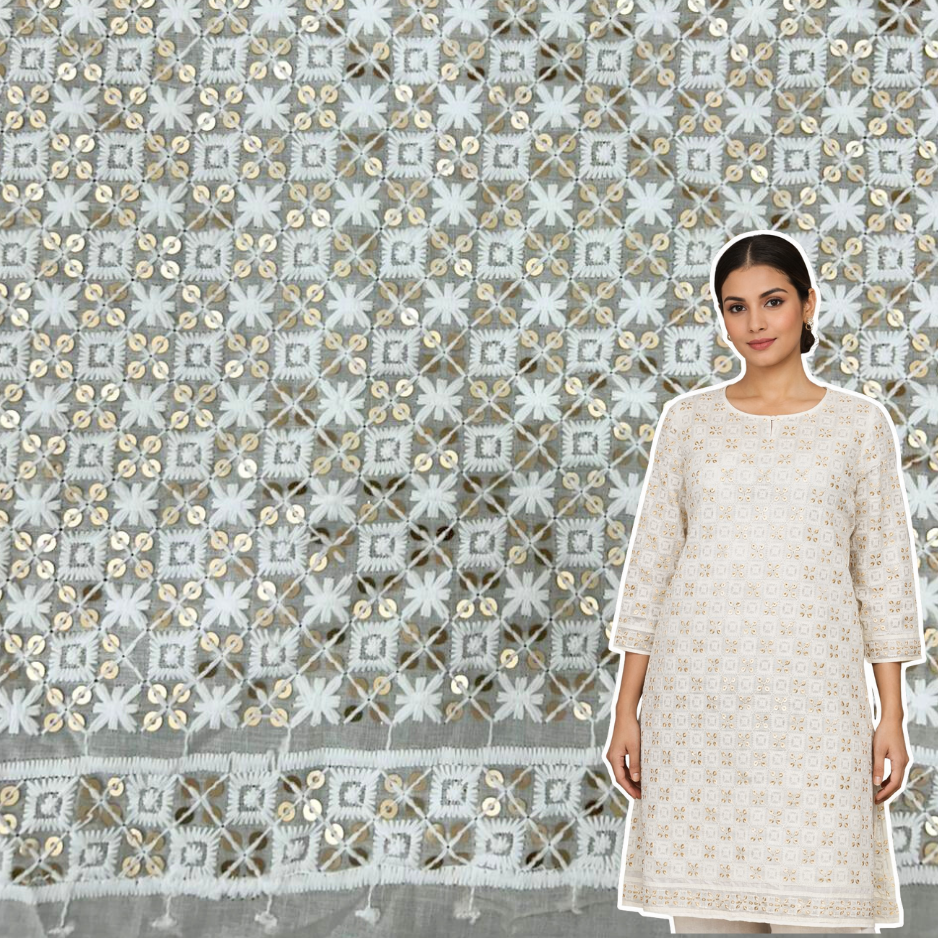 Textured fabric with geometric pattern and sequins on a gray background.