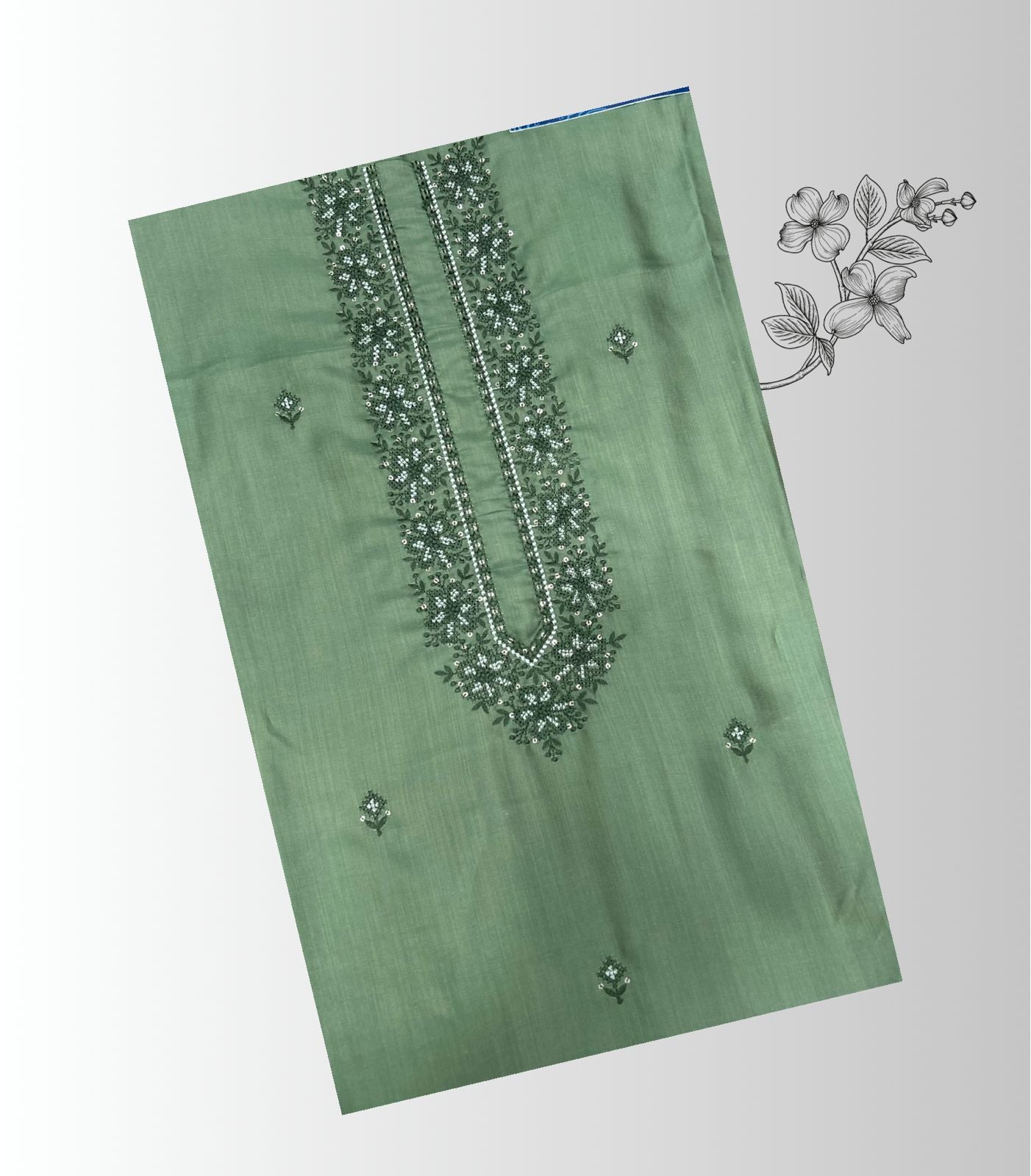 Unstitched pista green kurta pajama fabric set for men with thread embroidery and designer neckline.