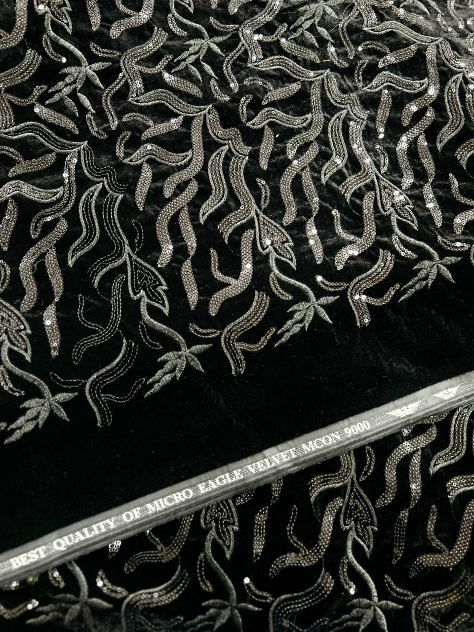 Luxury embroidered velvet material featuring metallic silver threadwork for sherwani and koti.