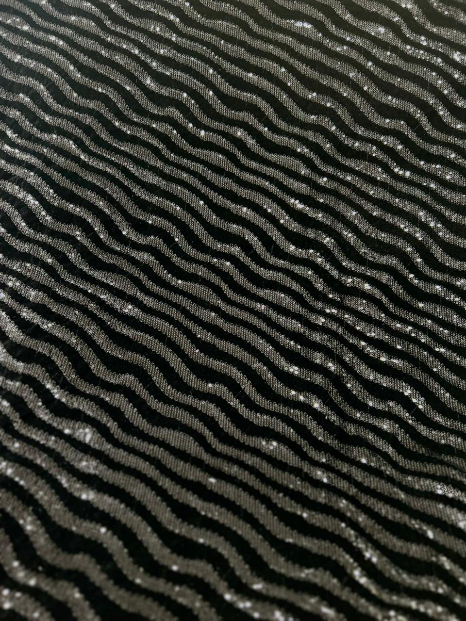 Premium black velvet fabric with metallic wavy pattern for designer garments.