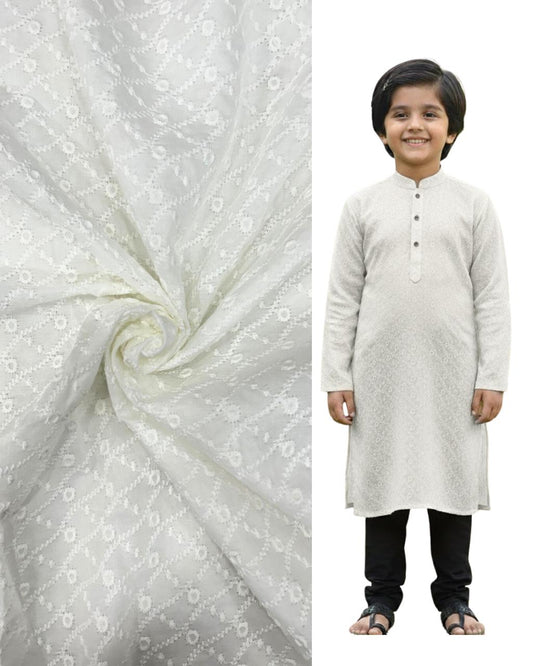 White embroidered kids kurta with matching subtle patterned fabric — premium boys ethnic wear, perfect for Eid special outfits, weddings, and festive celebrations.