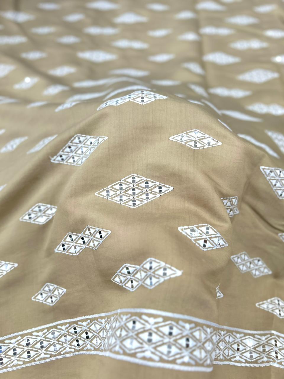 Beige men’s kurta fabric with contrast white thread embroidery and mirror detailing — soft 58-inch Roman silk.