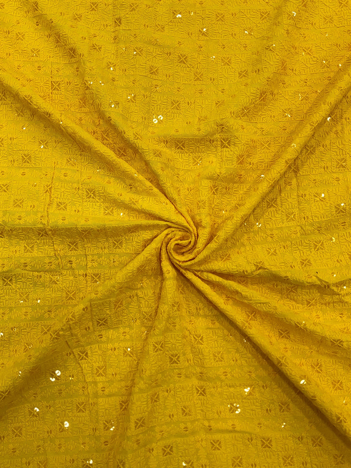 "Haldi special yellow mirror-work fabric with a child model wearing the festive special kurta for weddings and celebrations."