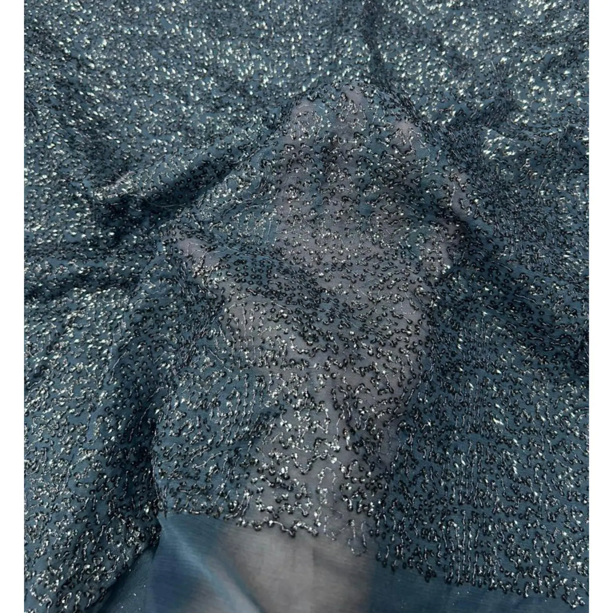 Black Sheer Sequins Mesh Fabric with Transparent Net and All-Over Sequin Embroidery for Gowns, Lehengas and Party Wear.