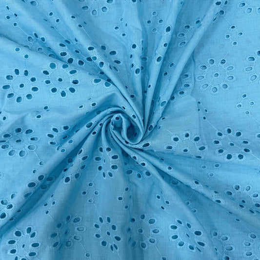 Premium Blue Hakoba Schiffli Cotton Fabric with elegant eyelet embroidery, 44-inch width, soft breathable cotton fabric for kurtis, dresses, salwar suits, tops, blouses and ethnic wear.