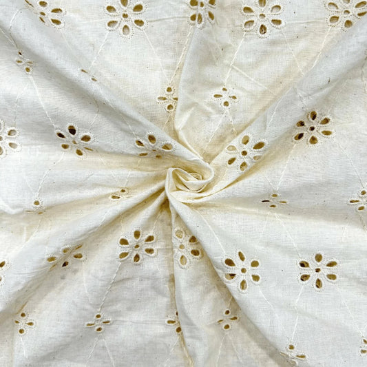 Dyeable Hakoba Schiffli fabric with floral embroidery on natural cotton base, soft breathable fabric for kurtis, dresses and kidswear.