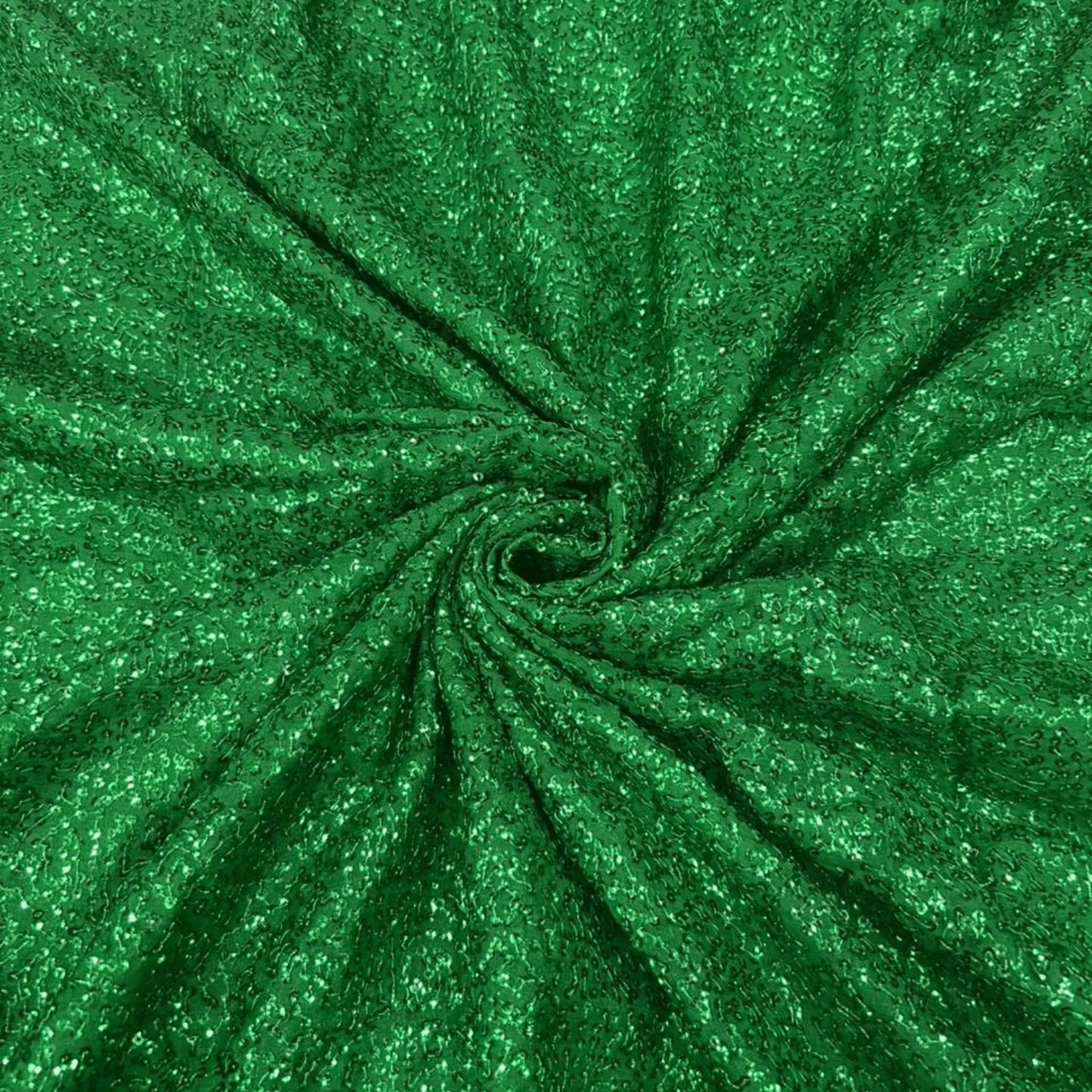 Premium emerald green Kichdi net fabric arranged in a spiral drape, featuring rich all-over textured Kichdi embroidery with a soft shimmer finish, ideal for bridal, party wear, gowns, lehengas and designer fashion.