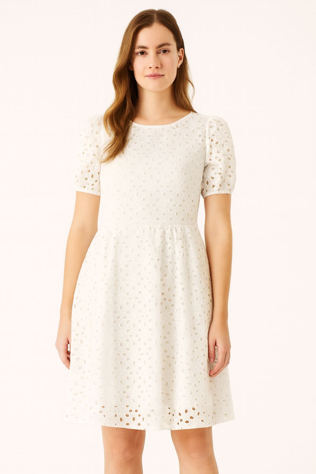 Premium white Hakoba Schiffli cotton fabric featuring large floral cutwork embroidery, perfect for making elegant summer outfits.