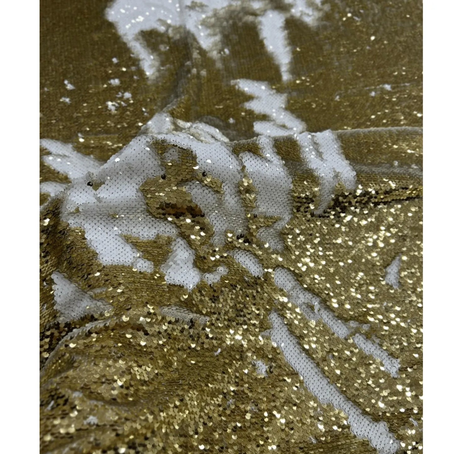 Luxury Gold White Reversible Sequin Net Fabric featuring dual-tone gold and white flip sequins with heavy glitter work in a close-up drape. Perfect for bridal wear, party wear gowns, lehengas, sarees, cocktail dresses and couture fashion.