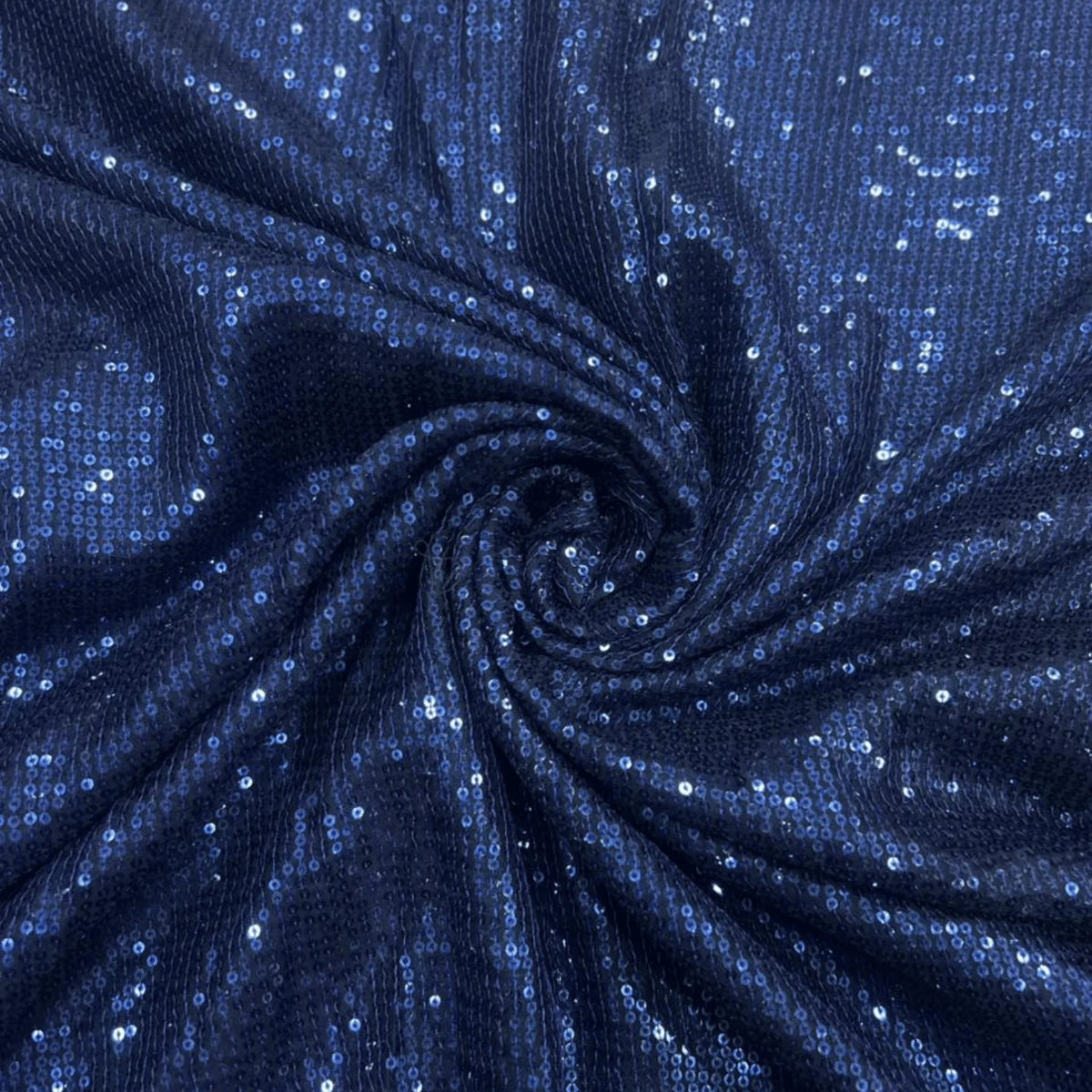 Luxury Navy Blue Sequin Georgette Fabric featuring dense all-over navy blue sequins with a premium shimmer finish, elegantly draped to highlight its sparkle. Perfect for sarees, party wear gowns, lehengas, cocktail dresses and evening couture.