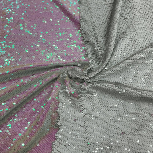 Premium White and Pink reversible sequin mesh fabric with sparkling flip sequins and heavy shimmer finish, ideal for wedding wear, evening gowns, festive dresses and designer apparel.