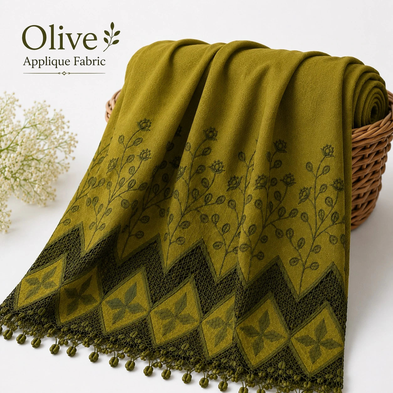 Olive cotton applique fabric draped to showcase embroidered border and premium finish.