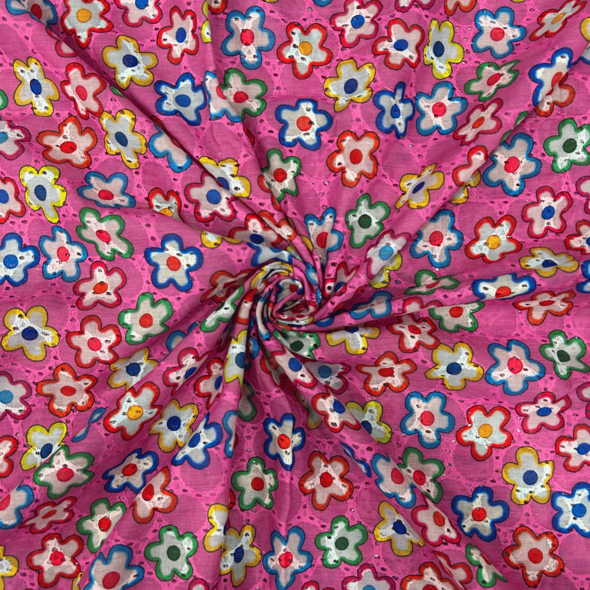 Premium Pink Multicolor Hakoba Schiffli Cotton Fabric with colorful floral print, soft breathable 44-inch wide cotton fabric for kurtis, dresses, tops, kidswear and ethnic wear.