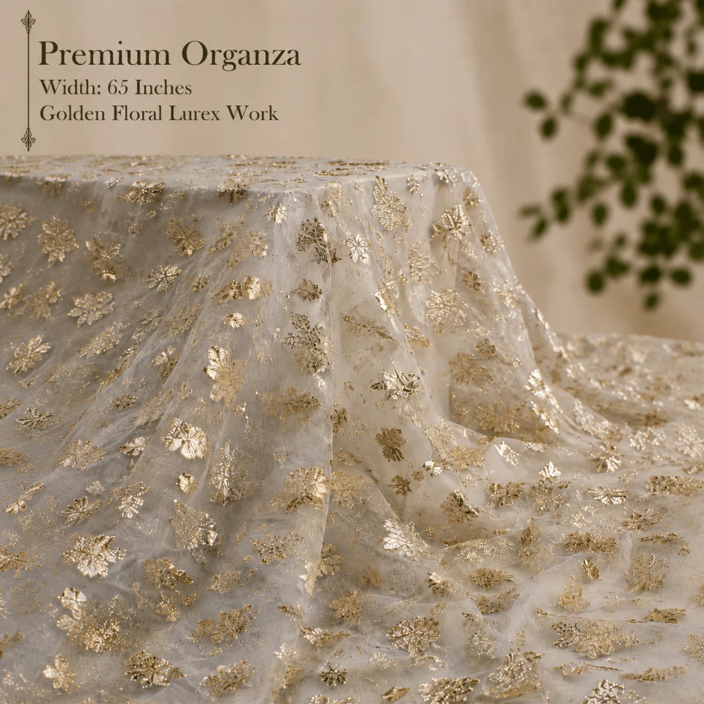 Premium organza fabric with golden floral lurex work, 65-inch width, lightweight sheer fabric for sarees, gowns, lehengas and festive wear.