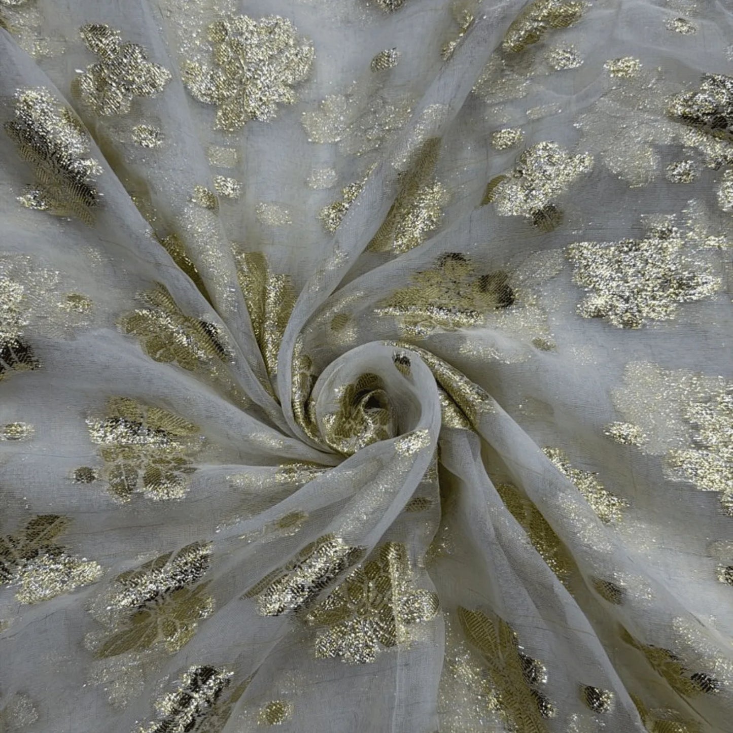 Premium viscose georgette fabric with elegant golden lurex weave, dyeable 65-inch width for sarees, gowns, lehengas, dupattas and kurtis.