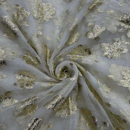 Premium viscose georgette fabric with elegant golden lurex weave, dyeable 65-inch width for sarees, gowns, lehengas, dupattas and kurtis.