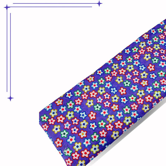 Premium Purple Multicolor Floral Hakoba Cotton Schiffli Fabric featuring vibrant colorful flower print with delicate eyelet embroidery on soft breathable cotton. Perfect for kurtis, dresses, tops, kidswear, ethnic wear and summer fashion garments.