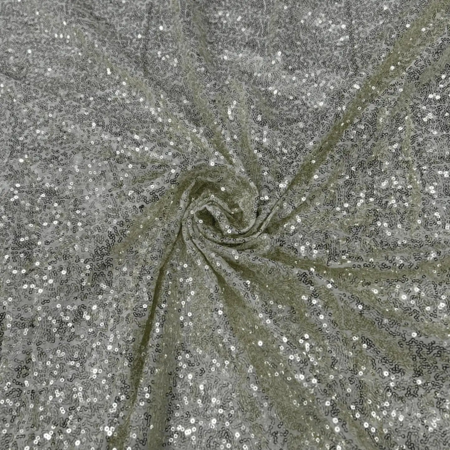 Premium shiny cream Kichdi net fabric arranged in a spiral drape, featuring heavy all-over textured Kichdi embroidery with an elegant shimmer finish on a soft net base, ideal for bridal lehengas, sarees, gowns, cocktail dresses and festive designer wear.