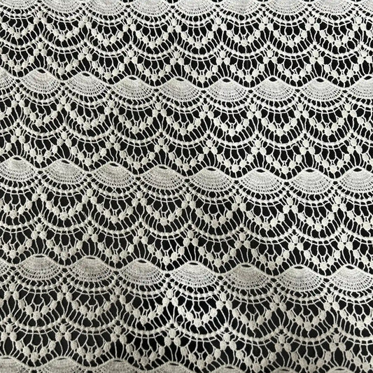 Premium white GPO chemical lace fabric featuring an elegant floral crochet pattern with scalloped design. Soft, lightweight and export-quality lace, ideal for saree borders, dupattas, gowns, dresses, blouses, kurtis and designer ethnic wear. Width: 44 inches.