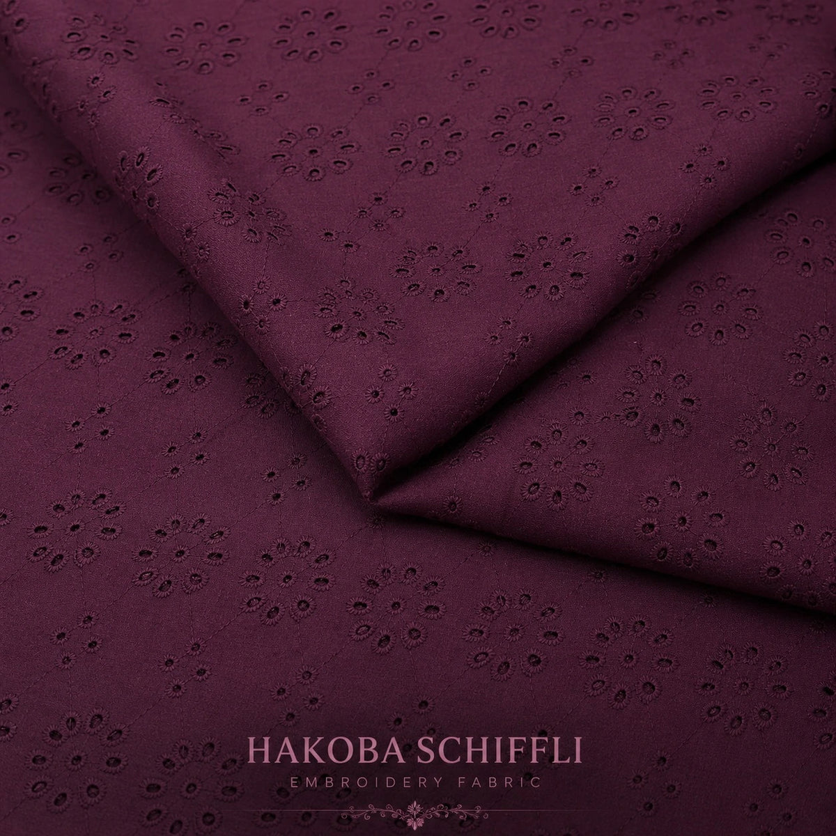 Premium wine cotton Schiffli embroidery fabric for kurtis and dresses.